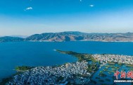 背篓装着K线图 在大理渔村邂逅“金融华尔街”